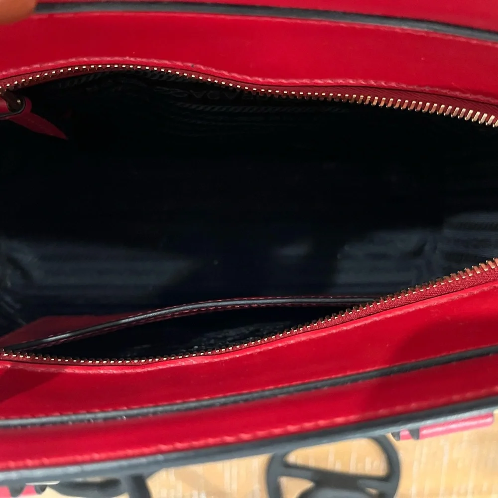Red Prada like new wore two times serious offers only
